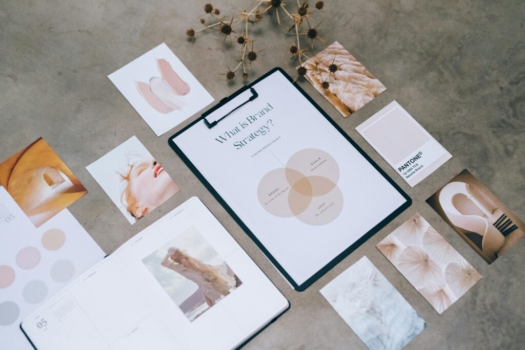 pexels-photo-7598017-7598017 Flat lay of a minimalist brand strategy moodboard on a concrete surface.